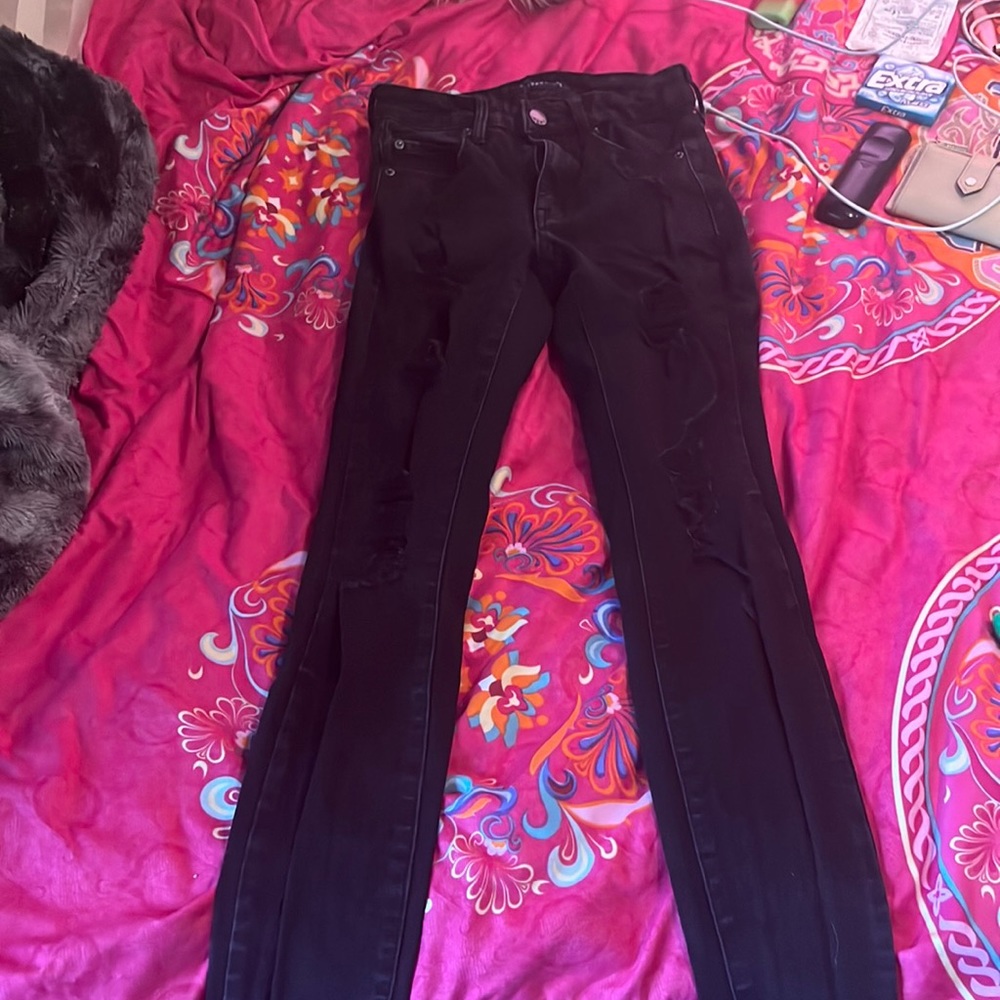 black ripped jeans